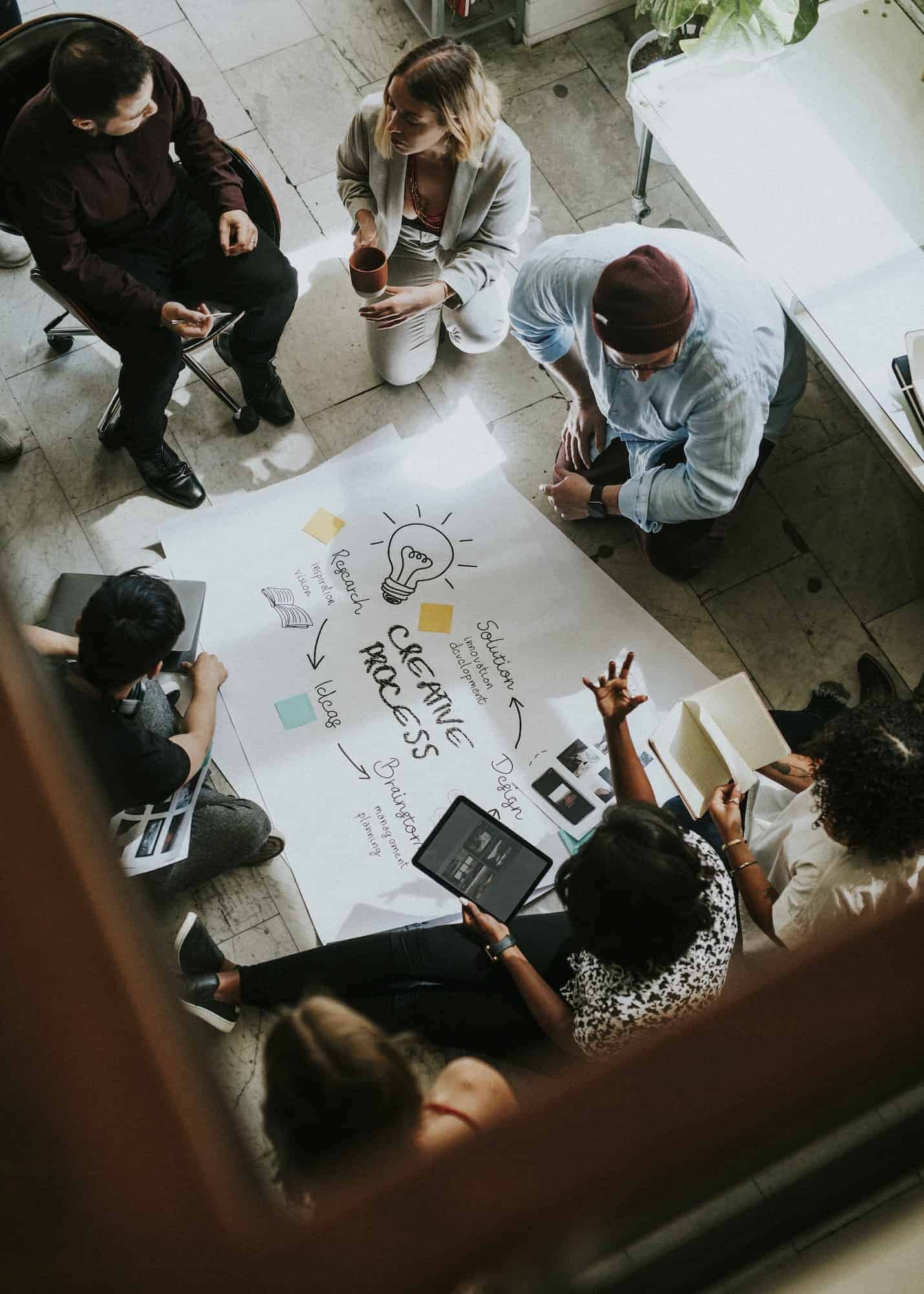 business-people-brainstorming-ideas-using-a-chart.jpg